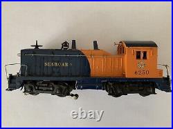 Lionel No. 6250 Seaboard NW-2 Railroad Diesel Switcher, Blue/Orange and trainset